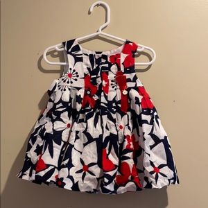 Red, white and blue floral dress for baby girl.